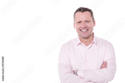 Smiling middle aged guy isolated over white © stockyimages