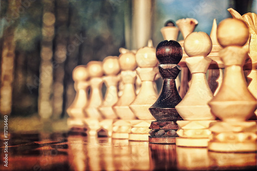 textured retro effect photo of chess on board concept