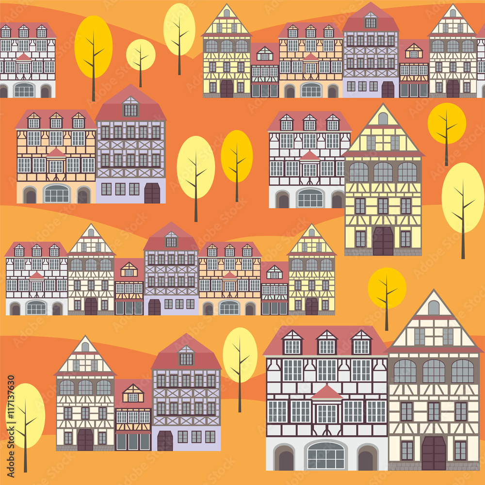 seamless pattern with the image of old town houses and trees. autumn cityscape.