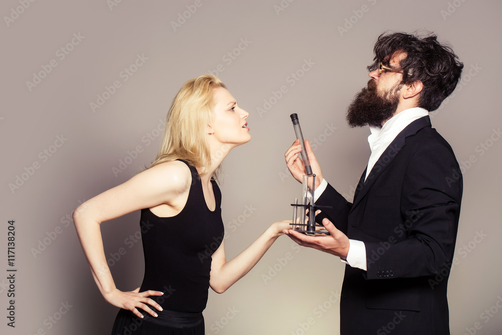 couple with chemical test tubes