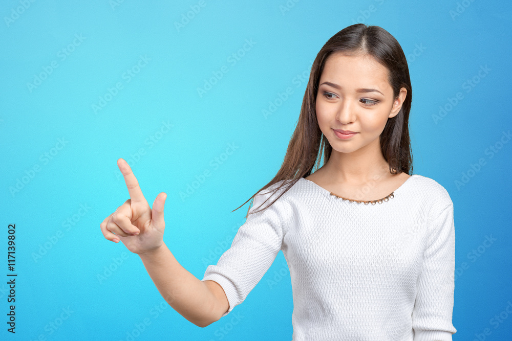 Businesswoman pressing button on visual screen Businesswoman pressing button on visual screen