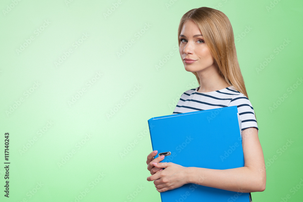 Portrait of smiling business woman with paper folder