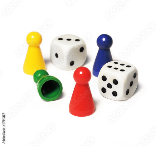 Playing pieces and dice, isolated on white background.