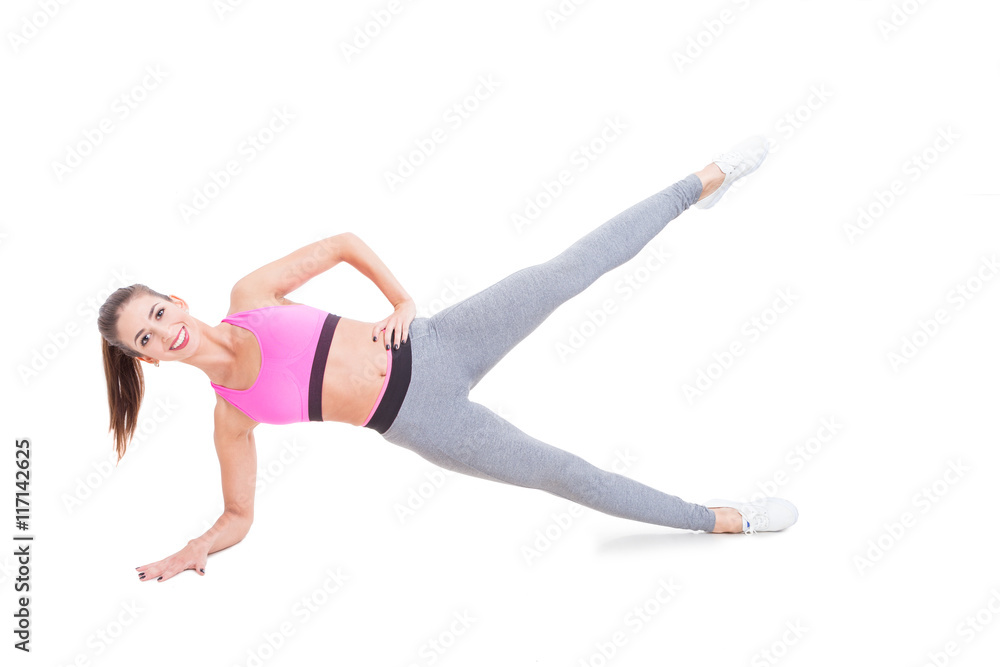 Lady working out standing in plank position