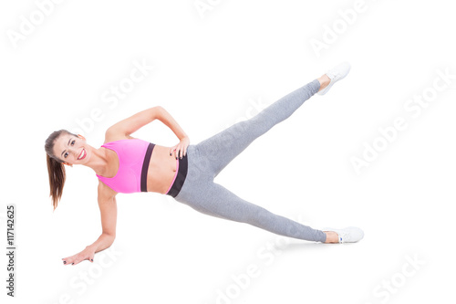 Lady working out standing in plank position
