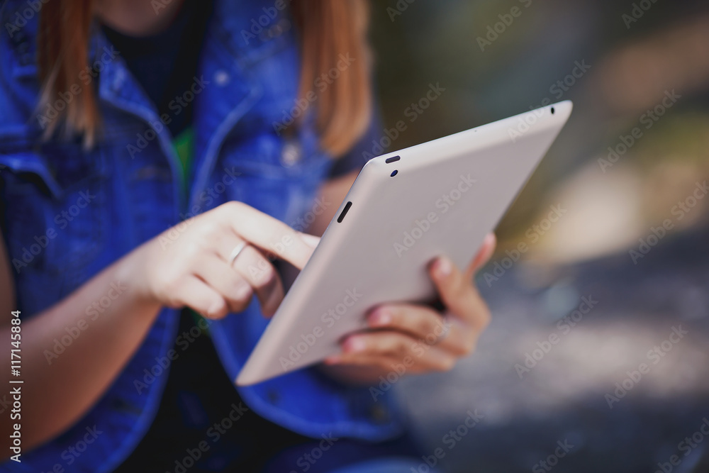 Fototapeta premium Young Woman, Girl Working With Tablet in Green Field, Park 