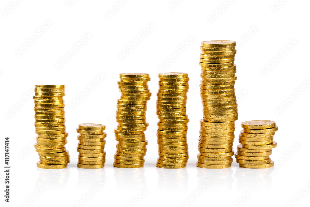 stacks of chocolate gold coins isolated on white background stacks of chocolate gold coins isolated on white background