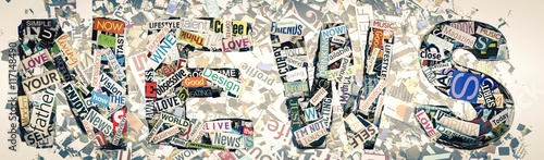 the word NEWS  Made from random cutout words photo