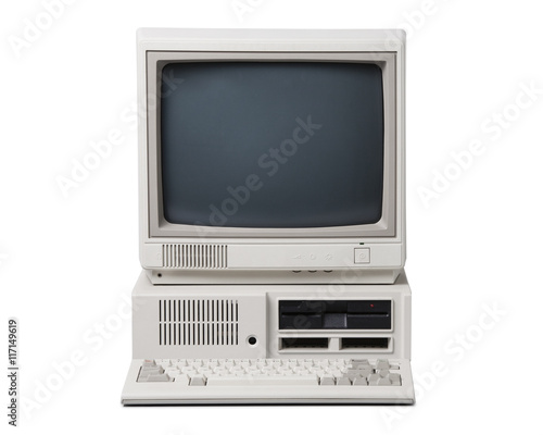 Old personal computer isolated on white background.