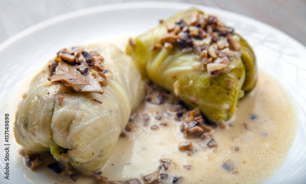 Stuffed cabbage with mushroom sauce, Golabki popular Polish dish Stuffed cabbage with mushroom sauce, Golabki popular Polish dish