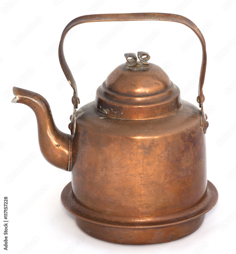 Old copper kettle on a white background Old copper kettle on a white background