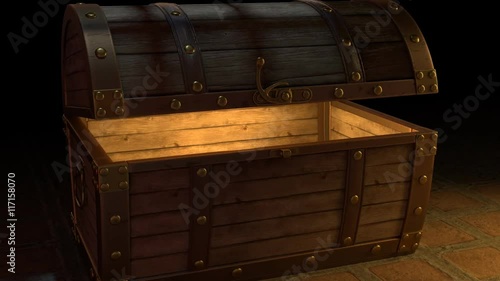 Unlocking and opening Treasure Chest. Transitioning inside the chest with a bright light inside. photo