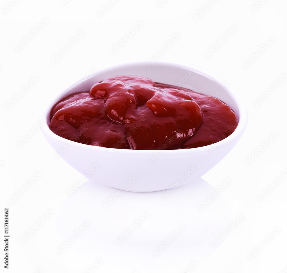 Tomato sauce in bowl on white background Tomato sauce in bowl on white background