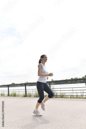 Running woman in the city