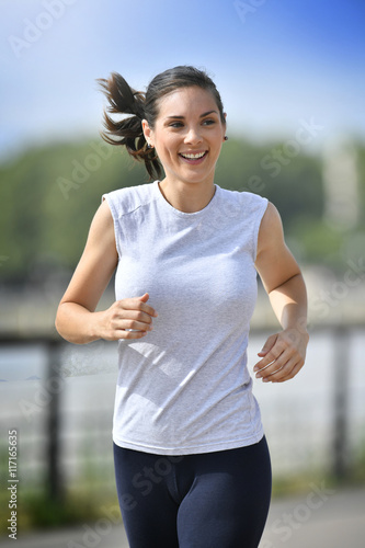 Running woman in the city