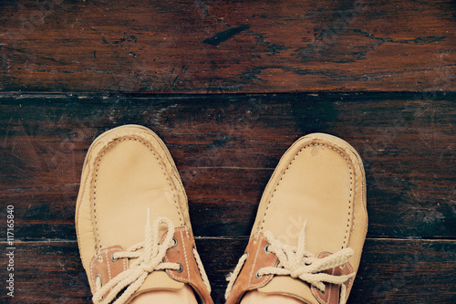 Top view leather shoes on wood floor - Vintage style
