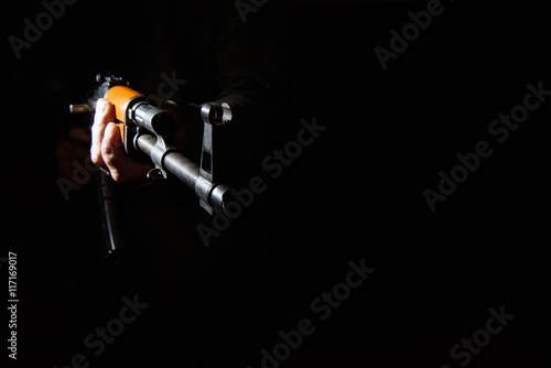 Tableau sur toile Kalashnikov assault rifle close-up in the dark