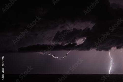 Thunderstorm over the mediterranean sea at night