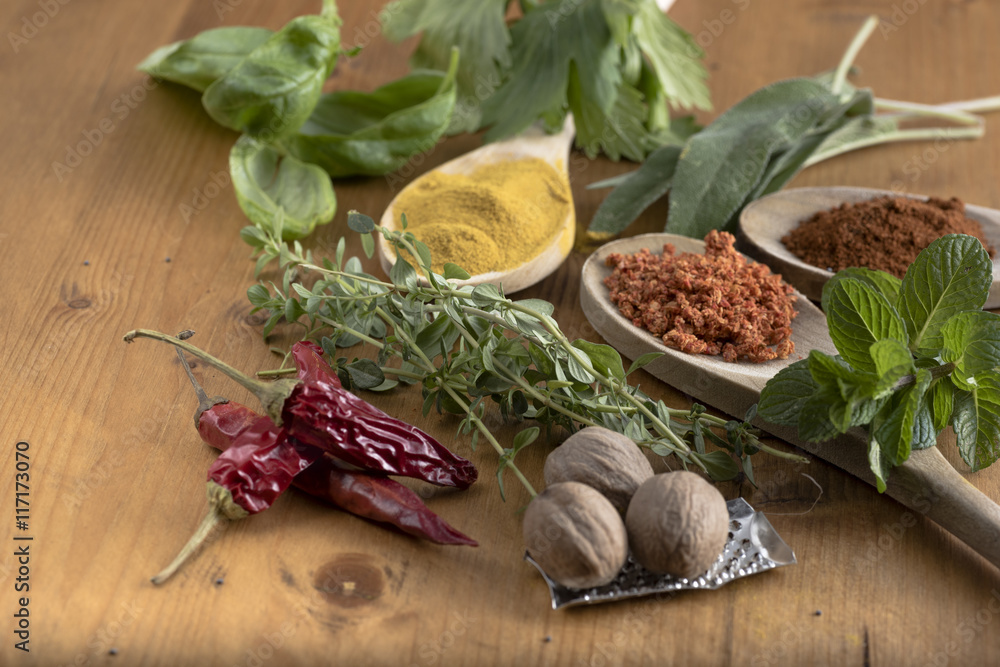 Εκτύπωση καμβά Various colorful spices and food drugs on wooden table