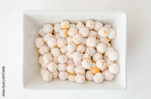 White chickpeas on white background photo