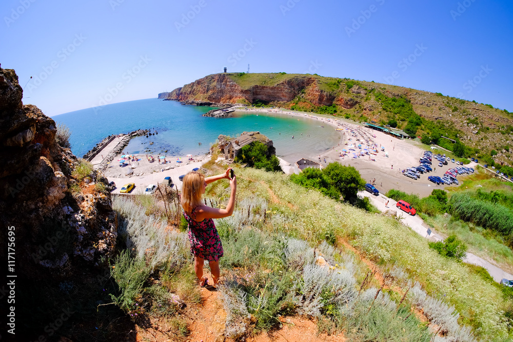 Φωτογραφία Blonde woman taking pictures at Bolata bay, Bulgaria, Black Sea.
