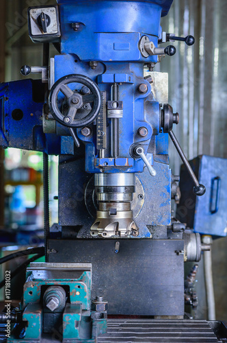 Detail of Milling machine in factory workshop.