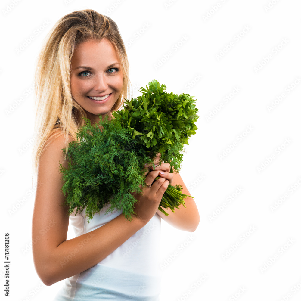 Portrait of a beautiful happy young woman with a bouquet of fresh greenery - parsley and dill Portrait of a beautiful happy young woman with a bouquet of fresh greenery - parsley and dill