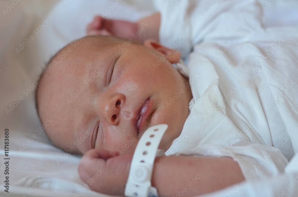 Close up portrait of two days old newborn boy in a hospital Close up portrait of two days old newborn boy in a hospital