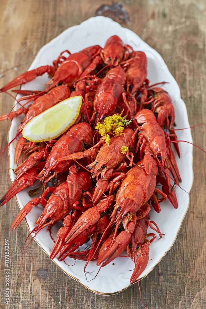 Plate of boiled crayfish with a lemon.top view. Plate of boiled crayfish with a lemon.top view.