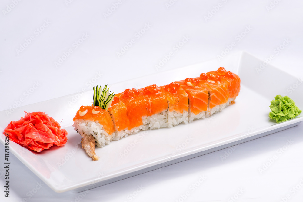 rolls with fish on a white plate. Serving for the restaurant menu rolls with fish on a white plate. Serving for the restaurant menu