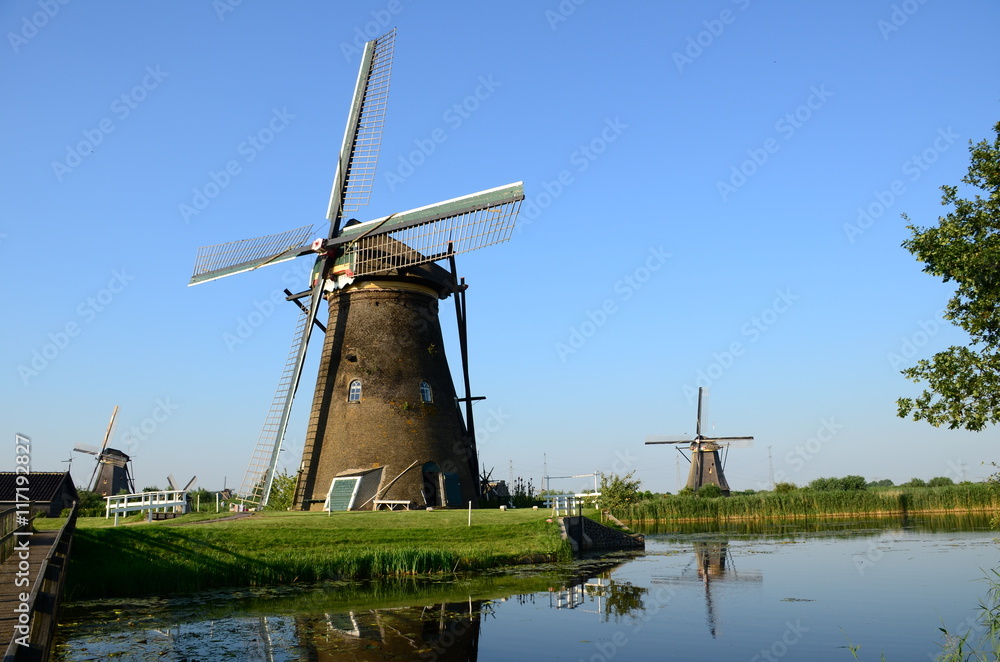 Traditional dutch windmills in the famous place of Kinderdijk, UNESCO world heritage site. Netherlands, Europe.