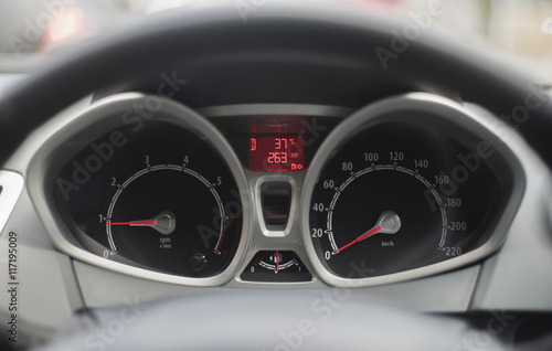 Close up shot of modern speedometer,car dashboard,daylight,selective focus,filtered image