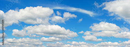 blue sky with cumulus clouds panoramic view environmental meteo photo