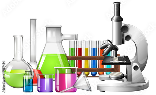 Science equipment with microscope and beakers