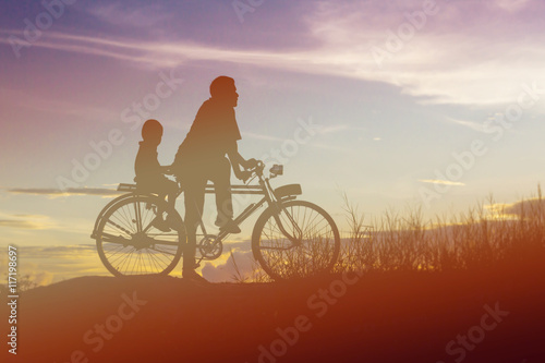 Biker family silhouette father and son