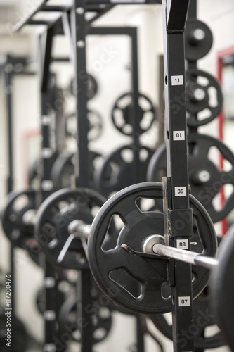 Obraz na płótnie Weights in a gym. w salonie