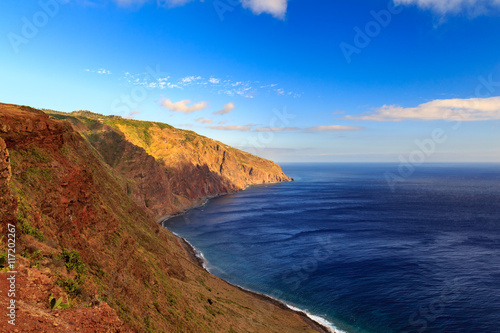 Beautiful Madeira landscape with azure water and green cliffs, Portugal © daliu