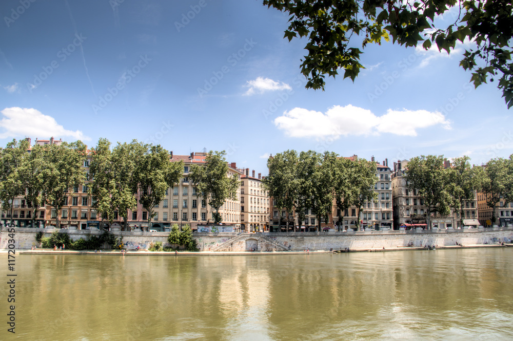 Colorful houses on the banks of the Saone river in Lyon, France
