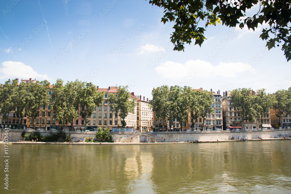Naklejka premium Colorful houses on the banks of the Saone river in Lyon, France 