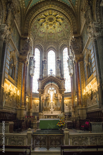 Various statues inside the Basilica of Notre Dame de Fourvière in Lyon, France 