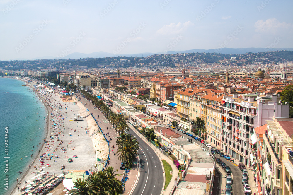 The Promenade d'Anglais of Nice in France seen from above with the beach and sea next to it

