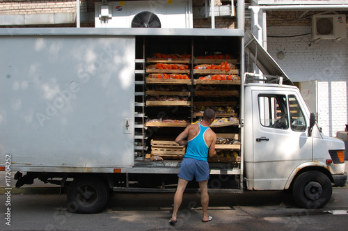 Minsk, Belarus - august 1, 2016, Uploading products from bakery bread van