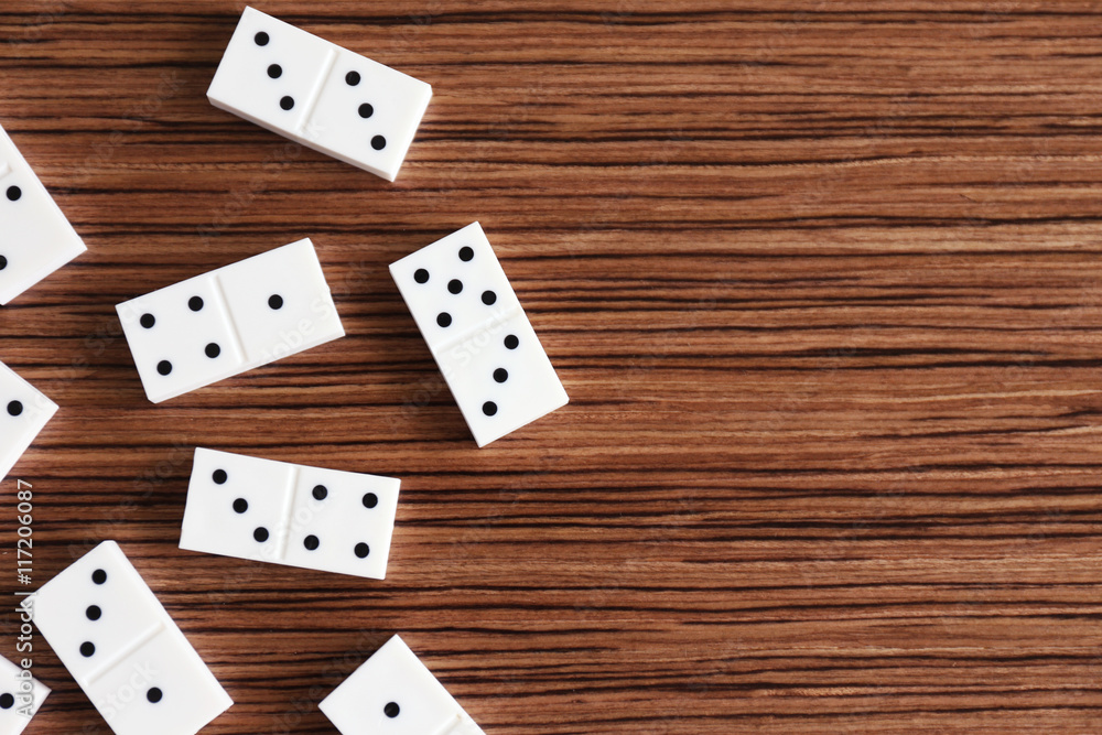 Heap of dominoes on wooden background Heap of dominoes on wooden background