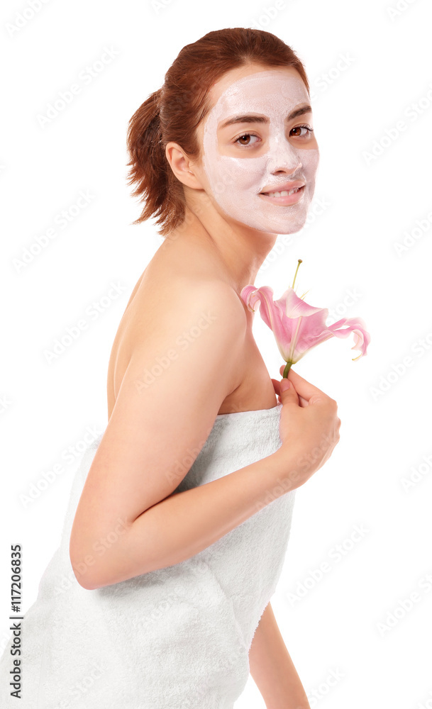 Young beautiful woman with facial mask isolated on white Young beautiful woman with facial mask isolated on white