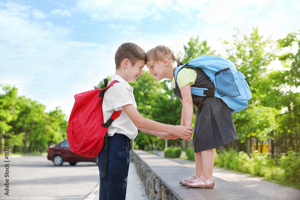 Brother taking sister to school Brother taking sister to school