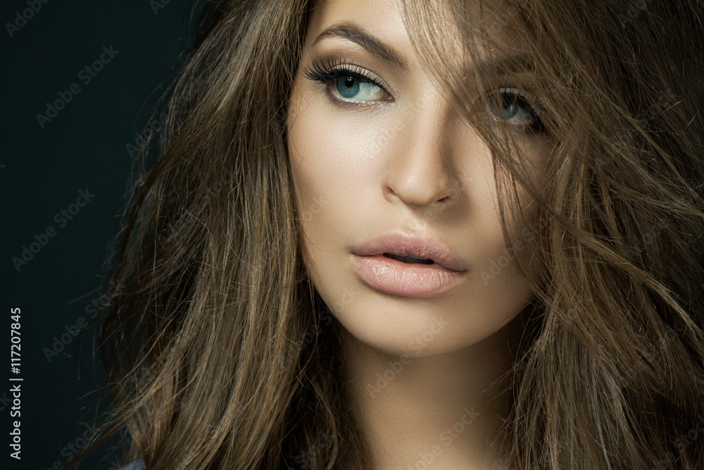 Woman with beauty long brown hair - posing at studio Woman with beauty long brown hair - posing at studio