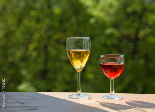 two wine glasses on table i