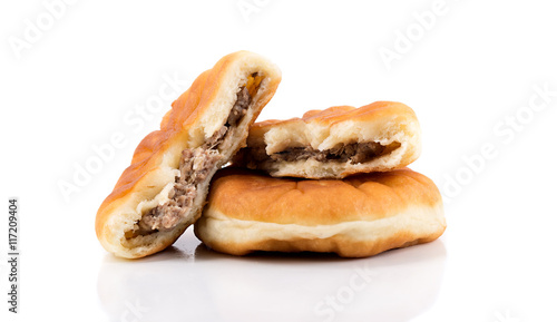 Traditional russian meat pies belyashi isolated on white background