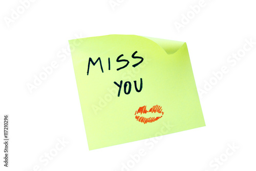 Post it with the text miss you on a white background seen from the front