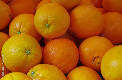 Orange navel oranges for market close-up